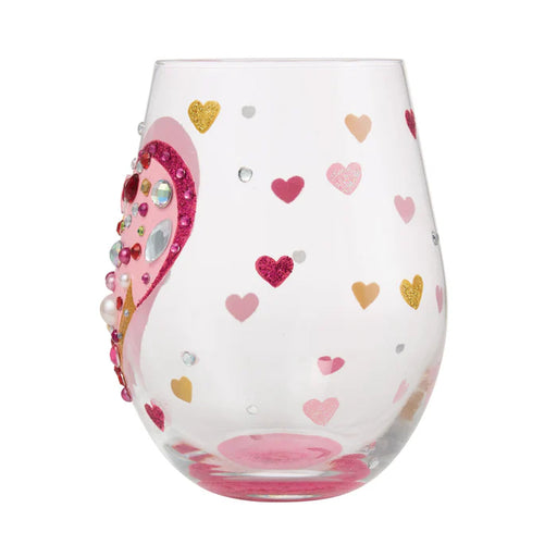 Decorative glass with heart patterns and pink accents on a white background