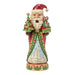 A Jim Shore Santa figurine holding a small decorated Christmas tree and a wrapped gift, set against a plain white background.