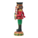 Decorative nutcracker figure holding a wreath and candy canes on a white background