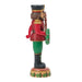 Decorative nutcracker figure with red outfit, green pants, and holding a candy cane on a white background.