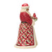 Festive Santa figurine holding a nest of cardinals on a white background
