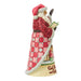 Santa Claus figurine with a book and Carolers scene on a white background