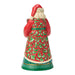 Decorative Santa figurine holding a puppy and a kitten on a white background