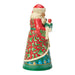 Decorative Santa figurine holding a puppy and a kitten on a white background
