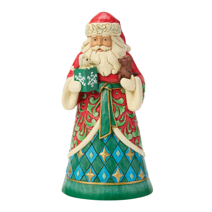 Decorative Santa figurine holding a puppy and a kitten on a white background