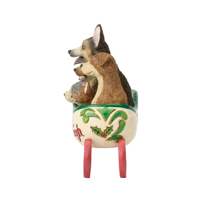 Decorative figurine of a sleigh with dogs inside with the phrase 'Santa's Rescue Sleigh' on a white background