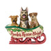 Decorative figurine of a sleigh with dogs inside with the phrase 'Santa's Rescue Sleigh' on a white background