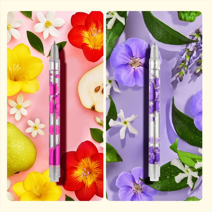 Two pens with floral designs on colorful backgrounds