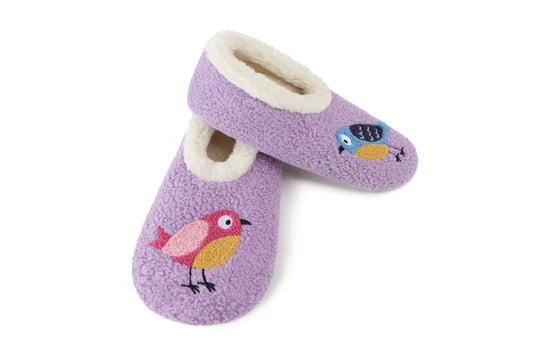 A pair of lavender purple fuzzy slipper shoes with cream lining and embroidered bird designs, shown on a plain white background.