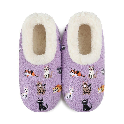 A pair of lavender purple fleece slippers with a white sherpa lining and an all-over print of various cat illustrations, shown against a plain white background.