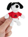 Small plush dog toy with a red shirt labeled 'Joe Cool' held in a hand against a white background