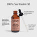Kit-sch 100% Pure Cold-Pressed Castor Oil bottle with dropper on a white background