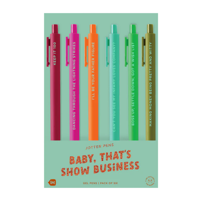 Pack of six colorful pens with humorous phrases on a light green background