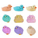 Set of colorful duck and chick figurines on a white background