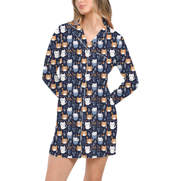 Navy blue nightshirt with cat pattern worn by a model on a white background