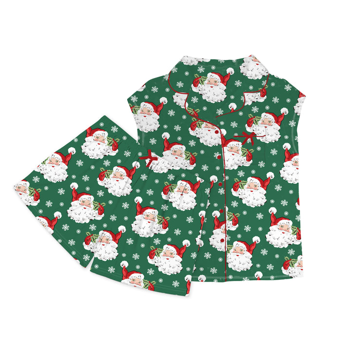 Green shirt and shorts with Santa Claus pattern on a white background