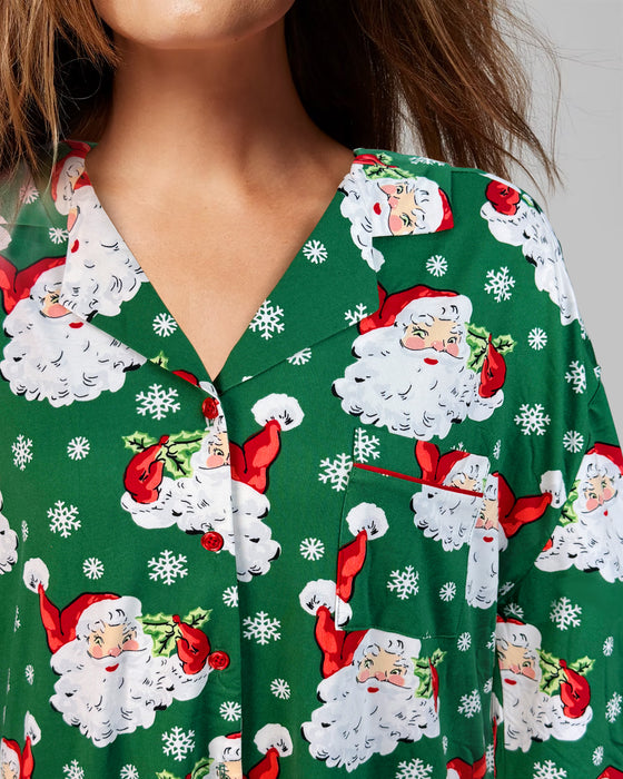 Green shirt with Santa Claus and snowflake pattern