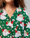 Green shirt with Santa Claus and snowflake pattern