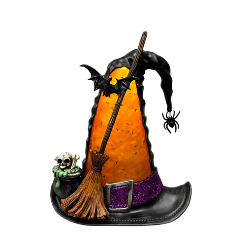A Halloween witch hat decoration with a textured orange pumpkin body, black brim and curved crown, purple glittery band, brown broom, black bat, spider, and small skull accent on a white background.