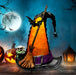 A Halloween-themed witch hat shaped like a pumpkin, glowing orange with a black brim, purple glitter band, broom, bat, spider, skull, and jack-o'-lanterns against a full moon night sky.