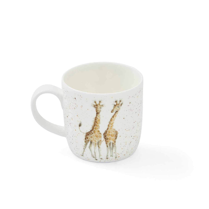 White mug with giraffe design on a white background