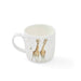 White mug with giraffe design on a white background