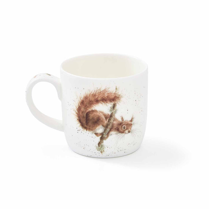 White mug with a squirrel design on a white background