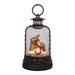 Decorative lantern snow globe with nativity scene on a white background