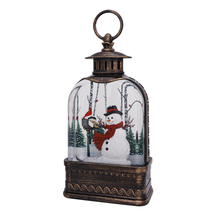 Decorative lantern with a snowman and winter scene inside on a white background