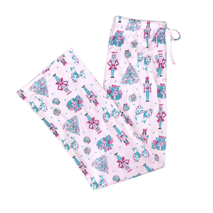 Pair of pajama pants with festive design on a white background