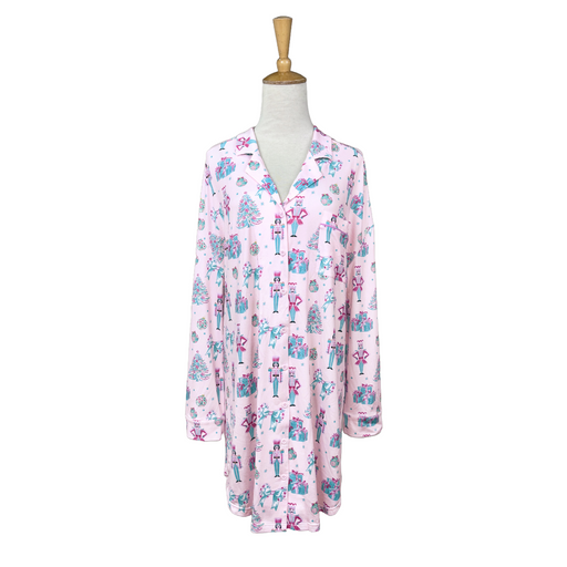Pink nightshirt with cartoon character print on a mannequin against a white background