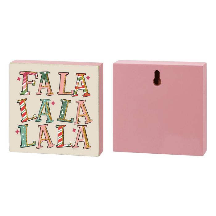 Decorative block with 'FALA LALA LALA' text on a white background