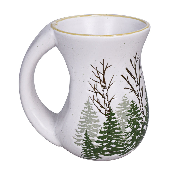 White mug with nature-themed design on a white background