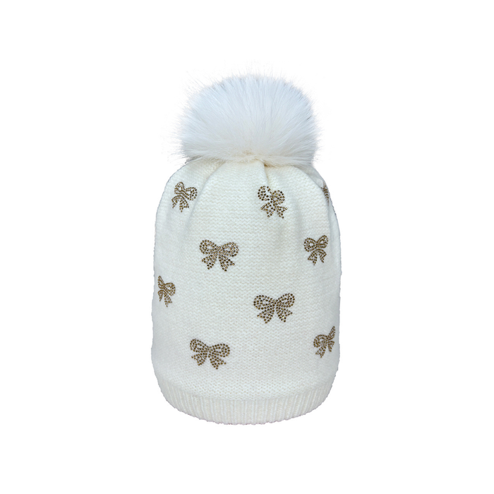 White knit hat with decorative bows and a white pom-pom on a white background