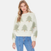 Woman wearing a sweater with tree pattern on a white background