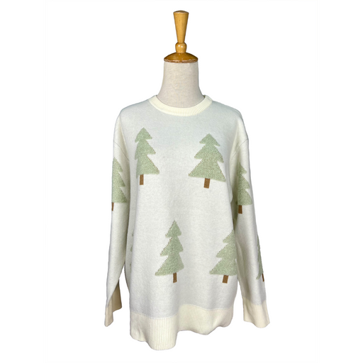 White sweater with green tree patterns on a mannequin against a white background
