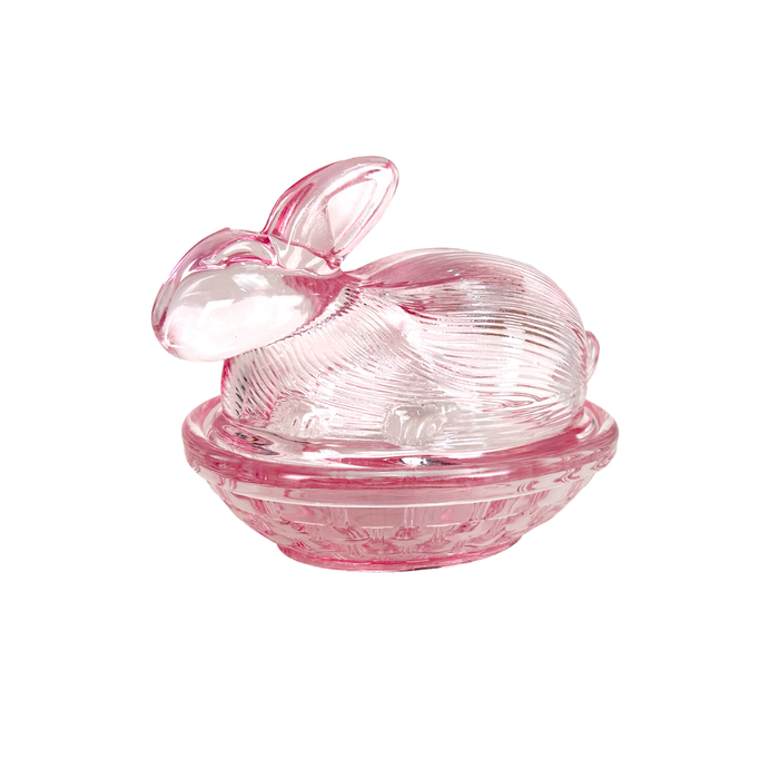 Pink glass rabbit-shaped container on a white background