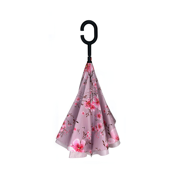 Floral-patterned umbrella with a black C-shaped handle on a white background
