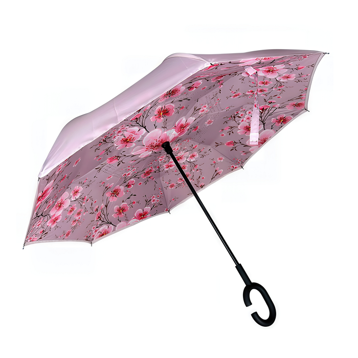 Floral-patterned umbrella with a C-shaped handle on a white background