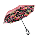 Floral patterned umbrella with a pink inside on a white background