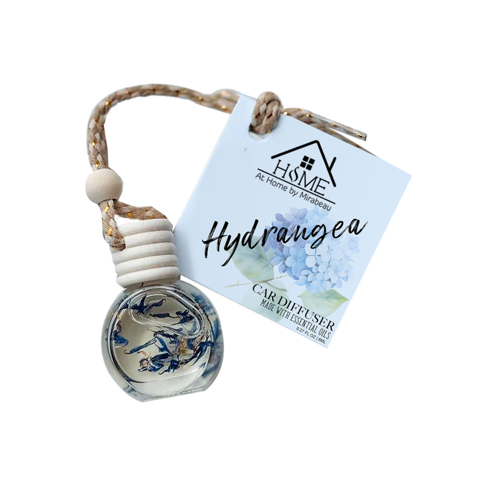 Car air freshener with 'Home by Mokobau' tag on a white background