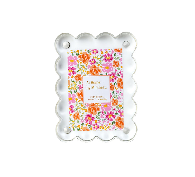 Decorative photo frame with floral design on a white background