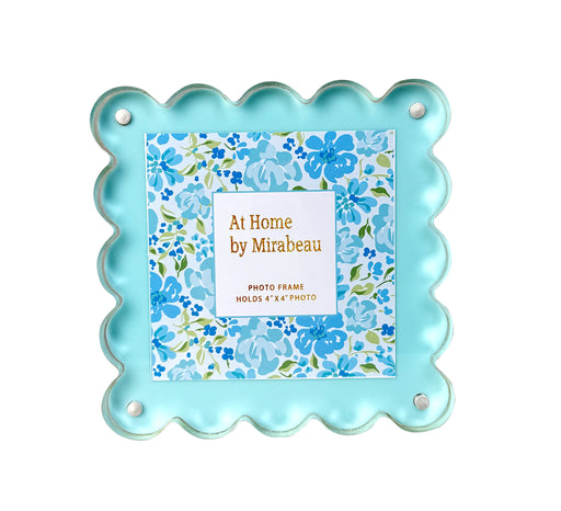 Floral photo frame with 'At Home by Mirabeau' branding on a white background