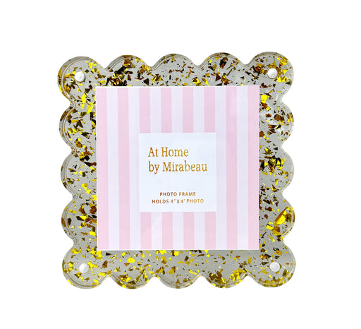 Decorative photo frame with gold glitter and pink striped label on a white background