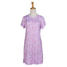 Floral patterned nightgown on a mannequin against a white background