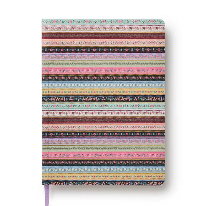 Notebook with colorful striped pattern on a white background