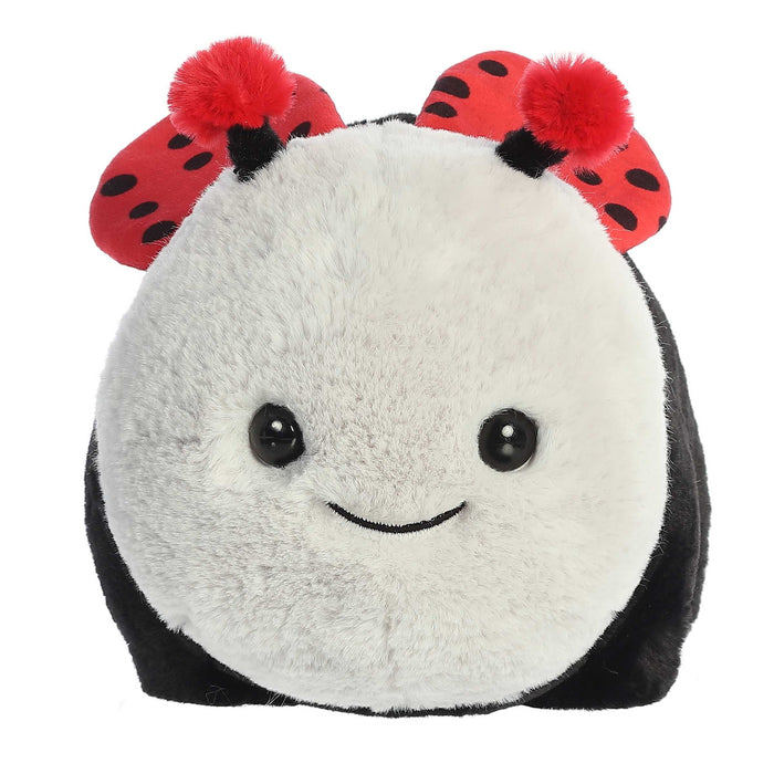 Plush toy with ladybug design on a white background