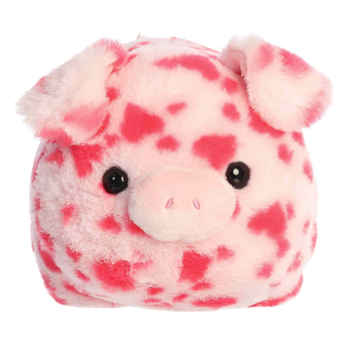 Plush toy pig with pink and white pattern on a white background