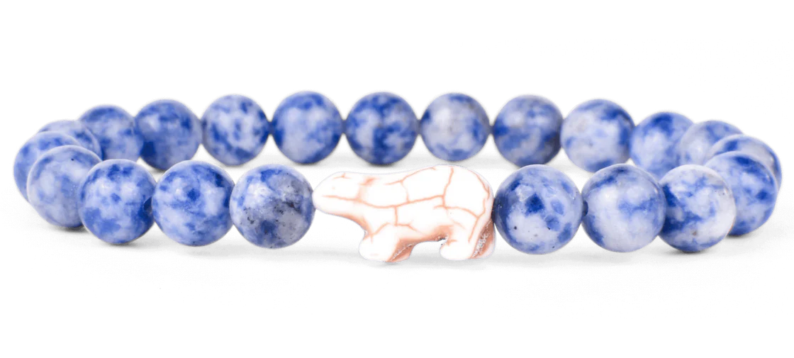 Blue beaded bracelet on a white background