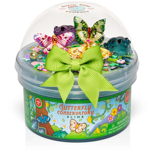 Butterfly conservatory slime set with toys and a green bow on a white background